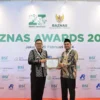 PJ Wali Kota Sukabumi, Kusmana Hartadji menerima penghargaan