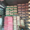 Pedagang beras di Pasar Gudang Kota Sukabumi sedang menunggui barang jualannya di tengah kondisi harga yang ak