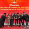 Ketua KPU Kalsel Andi Tenri Sompa bersama lima anggota KPU Tabalong